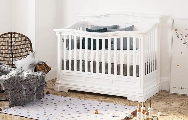 Side view of a crib in a kids room